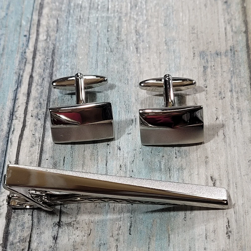 Cuff Links and Tie clip.